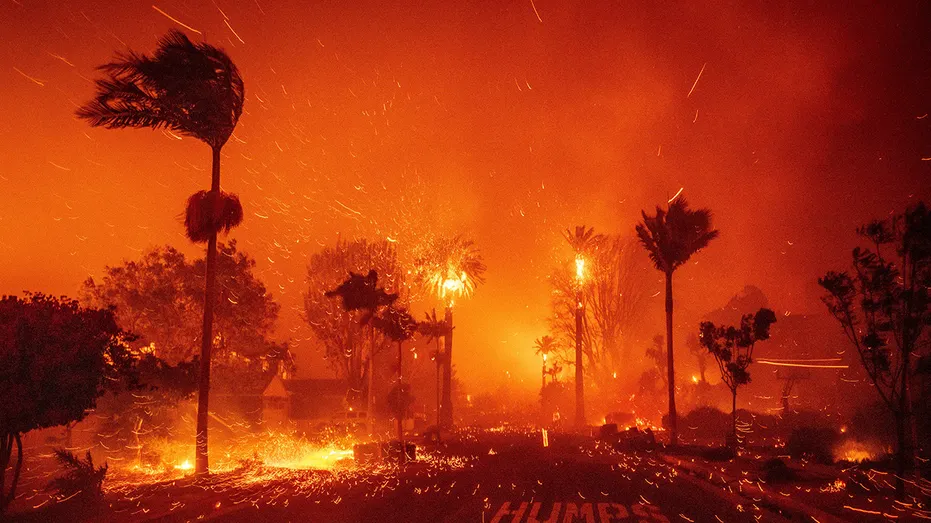 ‘Truly apocalyptic scenes’ as flames swallow homes in LA wildfires evacuation zone